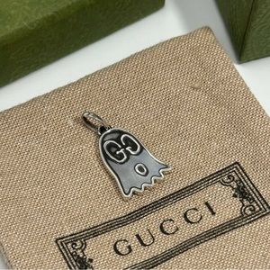 Gucci Ghost pendant necklace. Never worn, new in box.
